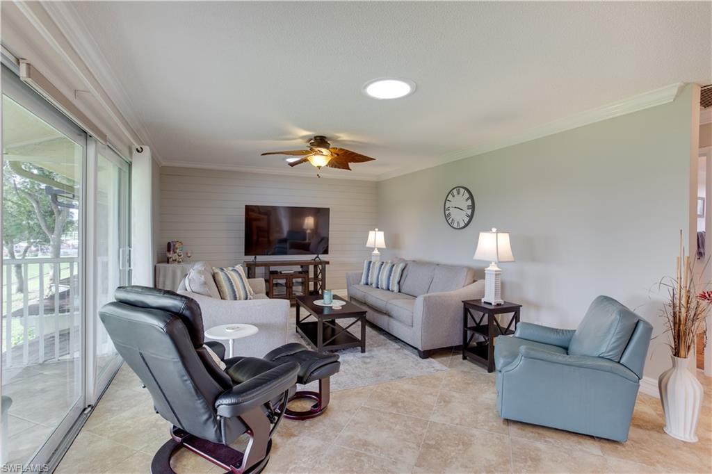 195 Harrison Road, Unit 4 Naples, FL 34112 - Photo 4 of 31 Watch golf on tv or out on the course!