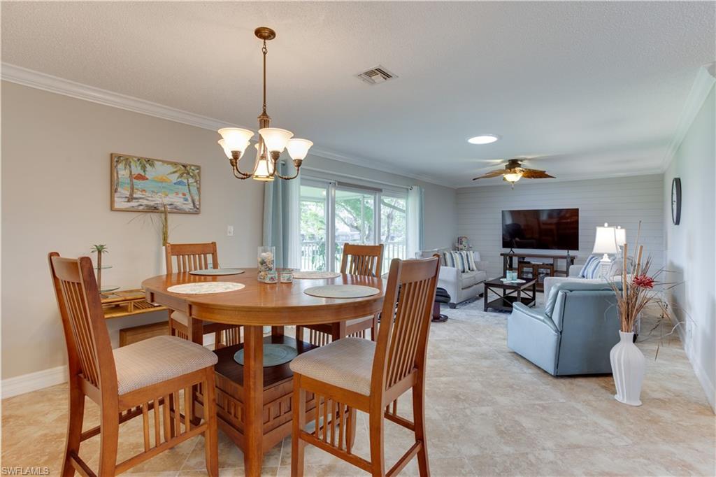 195 Harrison Road, Unit 4 Naples, FL 34112 - Photo 6 of 31 Dining area or great for a friendly game of cards!