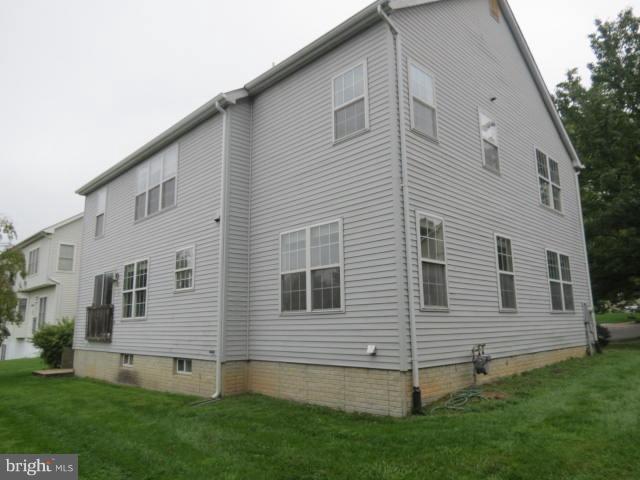 2126 Queensguard Road Silver Spring, MD 20906 - Photo 2 of 25 a view of a back yard of the house