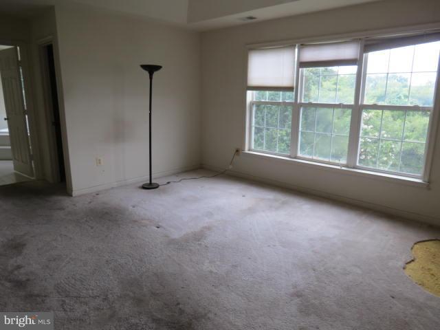 2126 Queensguard Road Silver Spring, MD 20906 - Photo 16 of 25 an empty room with a window
