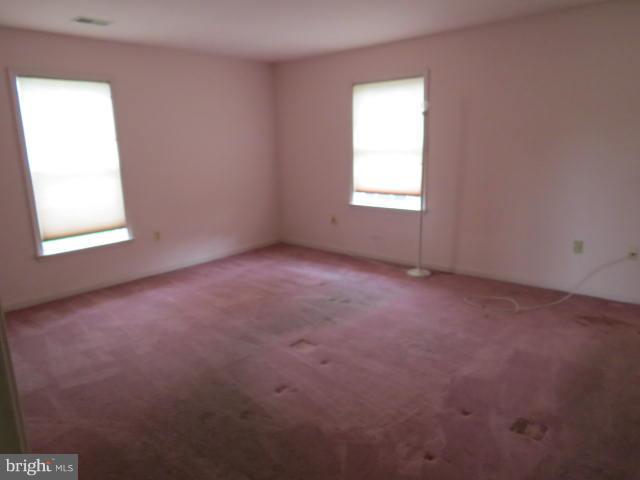 2126 Queensguard Road Silver Spring, MD 20906 - Photo 10 of 25 an empty room with a window