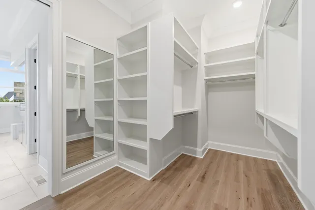 a view of an empty walk in closet