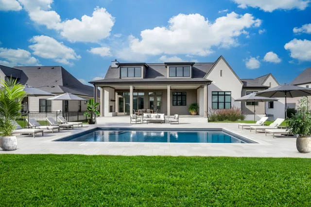 a front view of house with yard and seating area