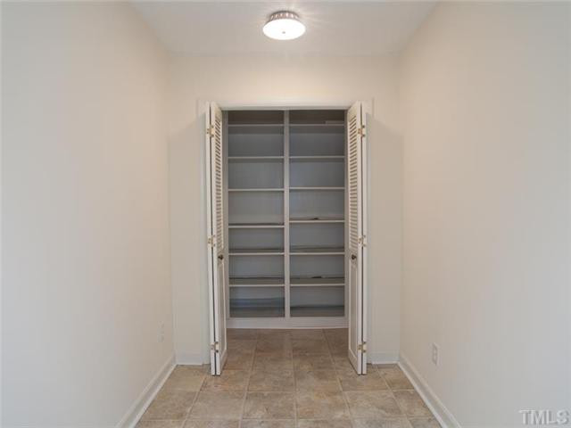 6109 Dodsworth Drive Raleigh, NC 27612 - Photo 16 of 21 Space that would be perfect for office or craft area featuring wonderful storage.