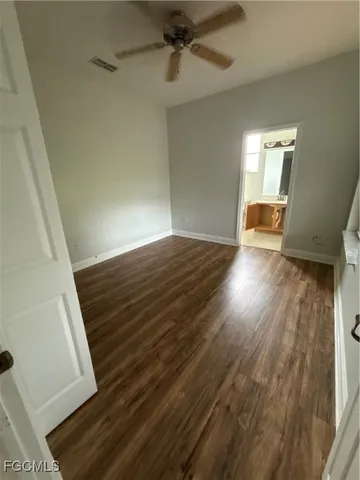 a bathroom with a sink a mirror and a shower