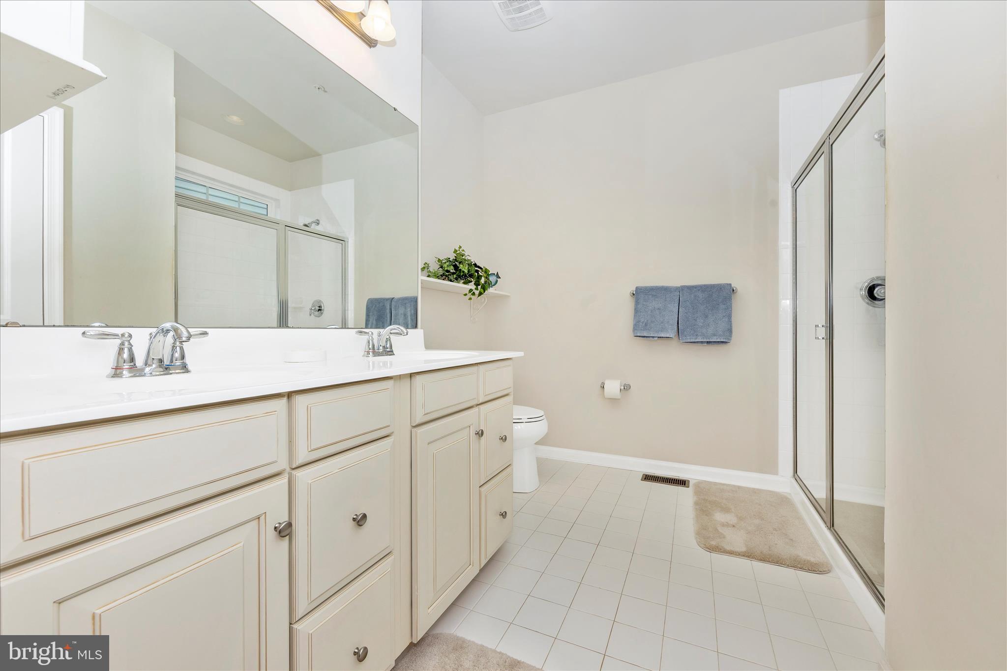 5903 Constance Way New Market, MD 21774 - Photo 18 of 53 a spacious bathroom with a double vanity sink mirror and
