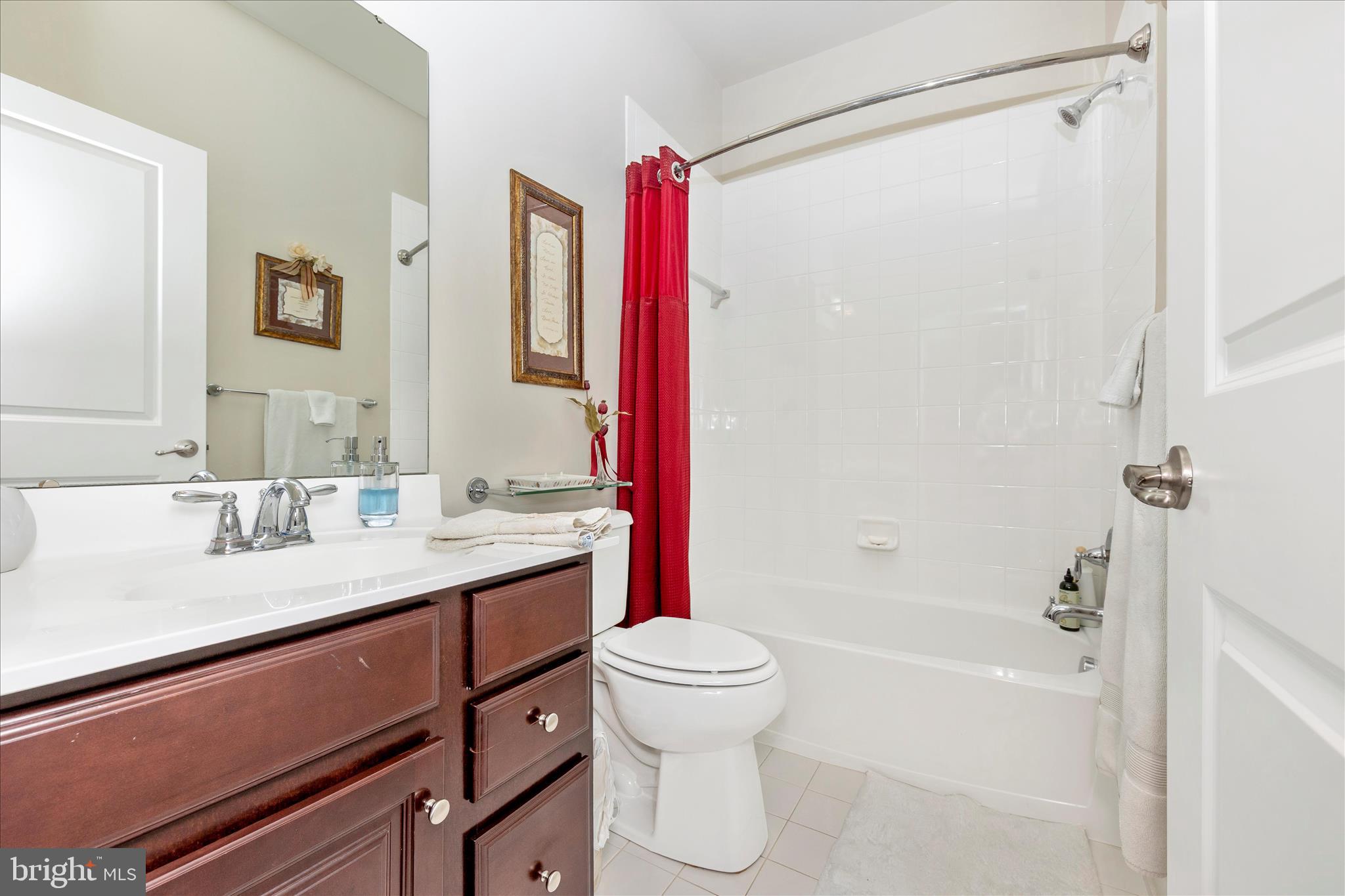 5903 Constance Way New Market, MD 21774 - Photo 25 of 53 a bathroom with a sink a toilet and a bathtub