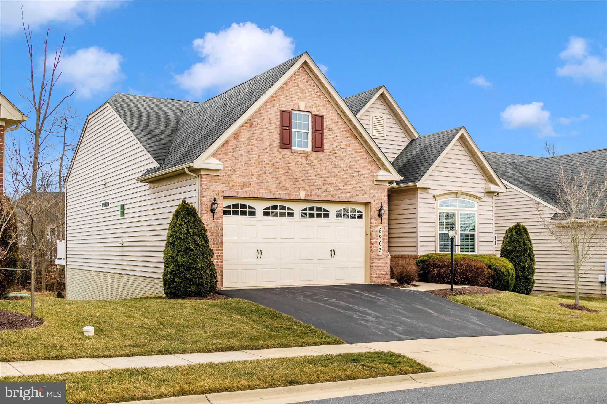5903 Constance Way New Market, MD 21774 - Photo 44 of 53 a view of a house with a yard and garage