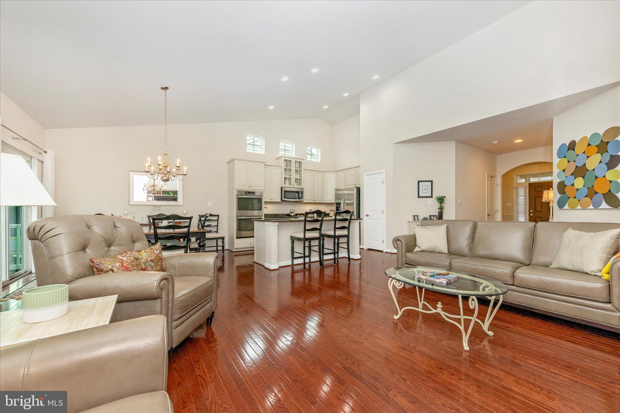 5903 Constance Way New Market, MD 21774 - Photo 9 of 53 a living room with furniture and a chandelier