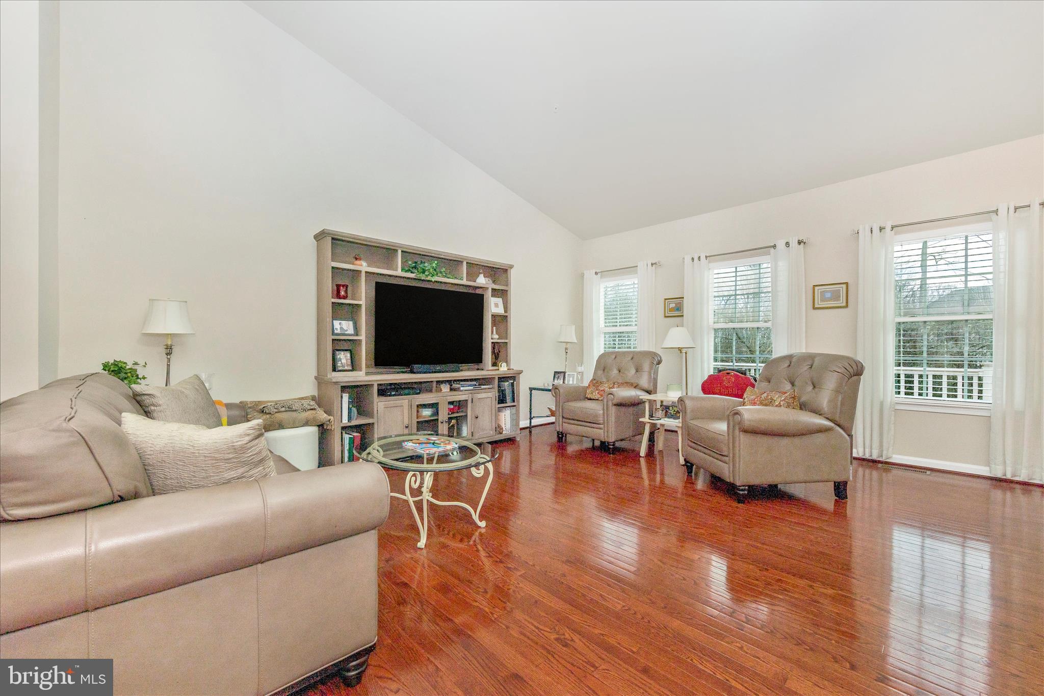 5903 Constance Way New Market, MD 21774 - Photo 53 of 53 a living room with furniture and a flat screen tv