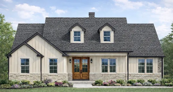front view of a house with potted plants