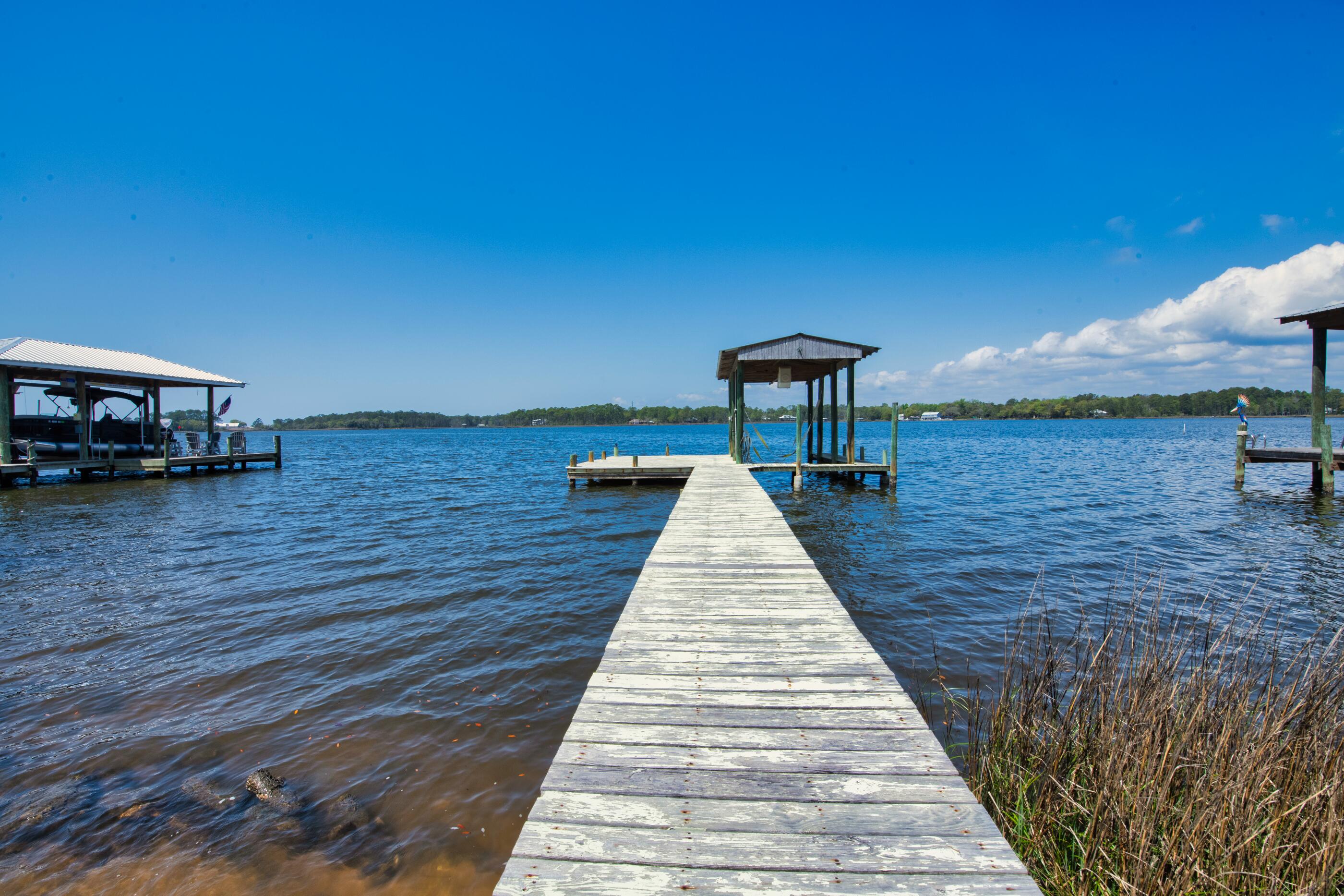 1422 Lagrange Road Freeport, FL 32439 - Photo 80 of 96 boardwalk to covered boat dock