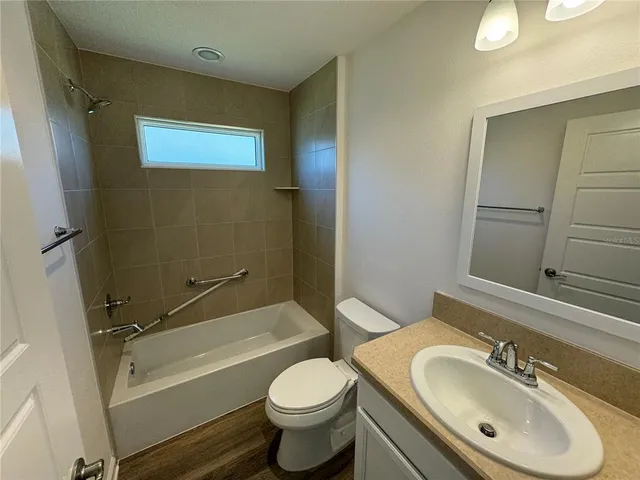 a utility room with washer and dryer