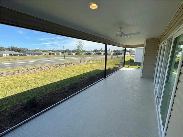 a view of a house with a back yard