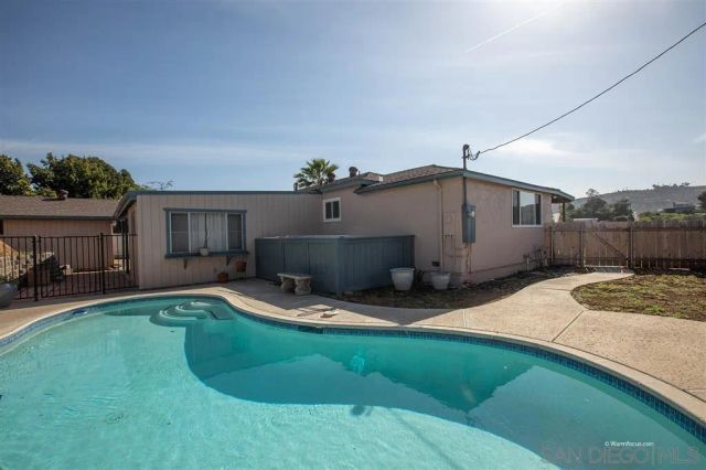 a view of a backyard of a house