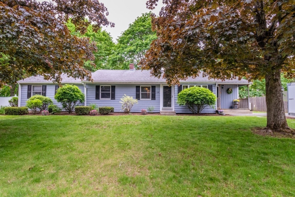 118 Bruce Road Walpole, MA 02081 - Photo 2 of 30 a front view of a house with yard and green space