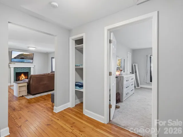 a view of a bedroom from a hallway