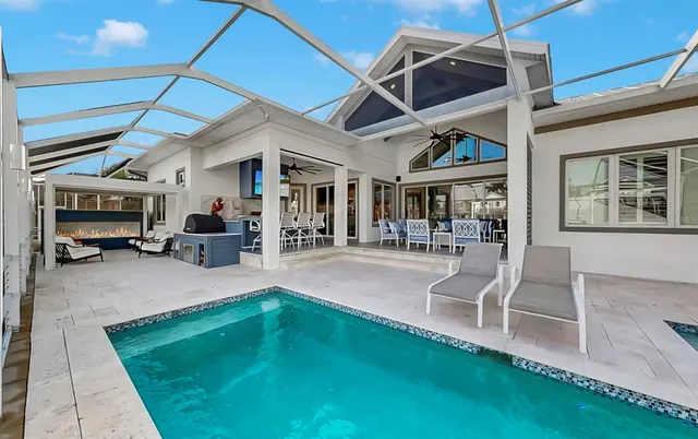 a view of a livingroom with furniture and a chandelier