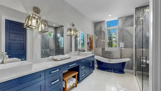 a view of house with a yard and potted plants