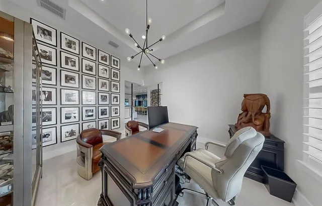 a living room with furniture fireplace and a flat screen tv