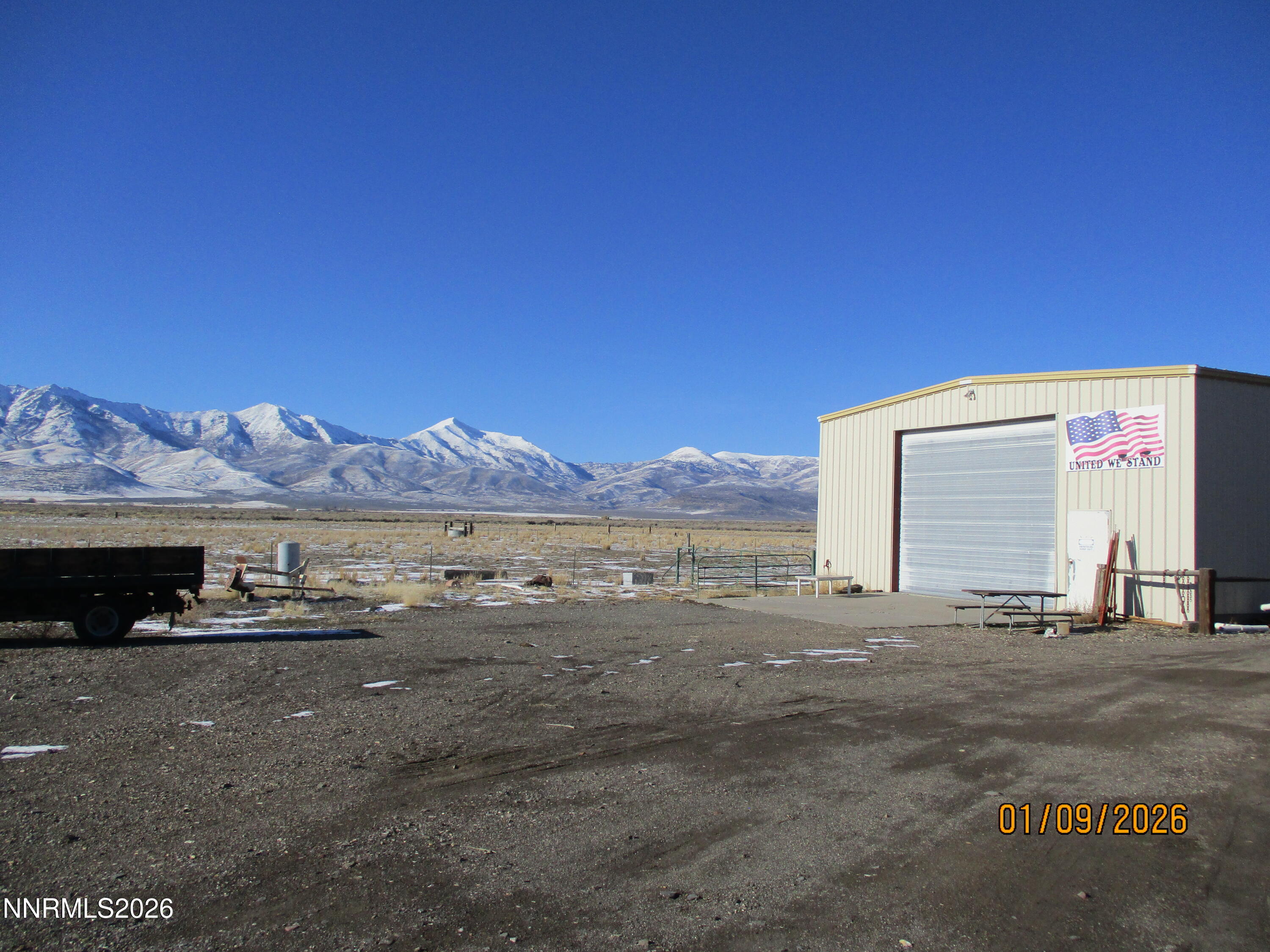 13405 Chimney Dam Road Paradise Valley, NV 89426 - Photo 12 of 90 a view of a road with a building in the background