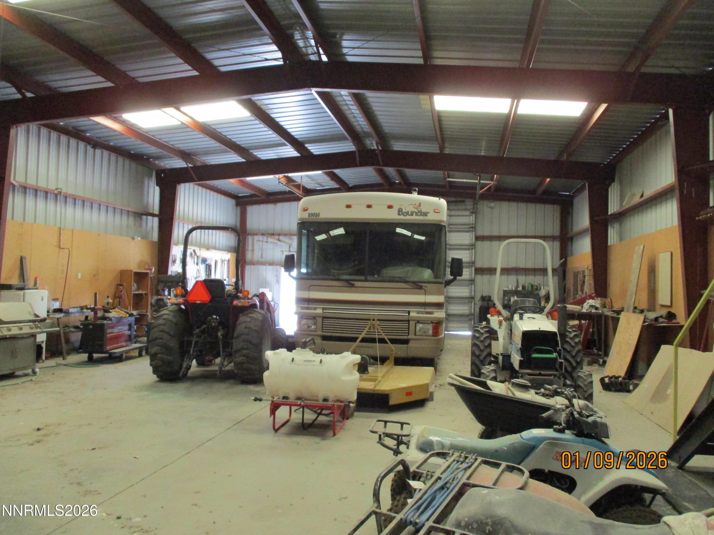 13405 Chimney Dam Road Paradise Valley, NV 89426 - Photo 18 of 90 a living room with lots of furniture and a chandelier