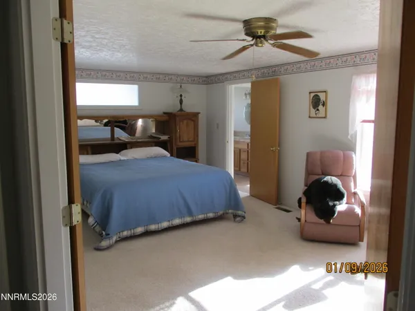 a kitchen with a sink cabinets and window