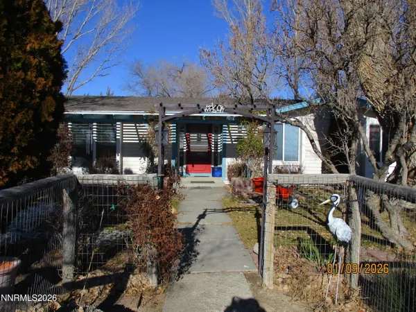 a view of a car park in front of house