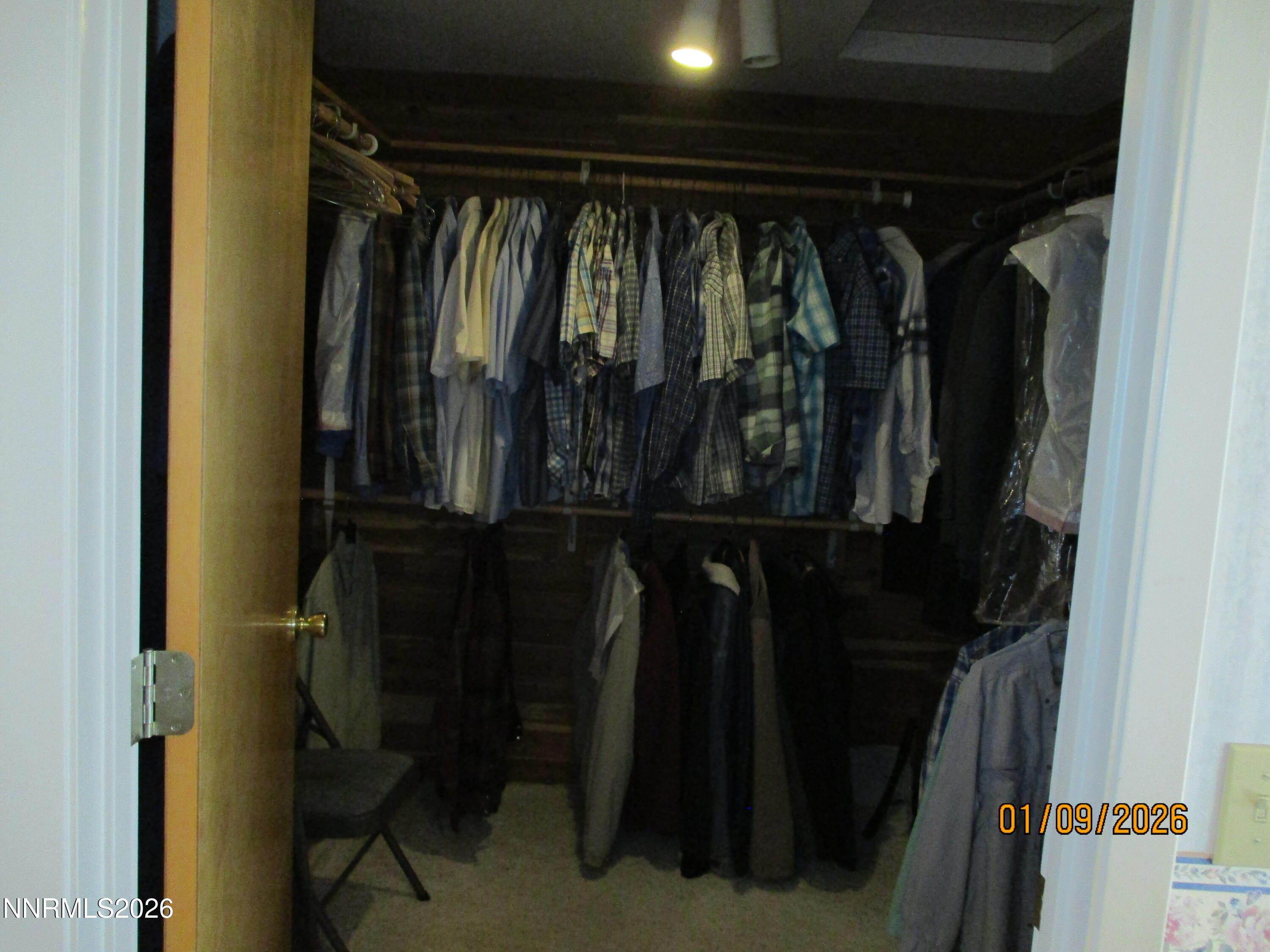 13405 Chimney Dam Road Paradise Valley, NV 89426 - Photo 33 of 90 a close view of walk in closet