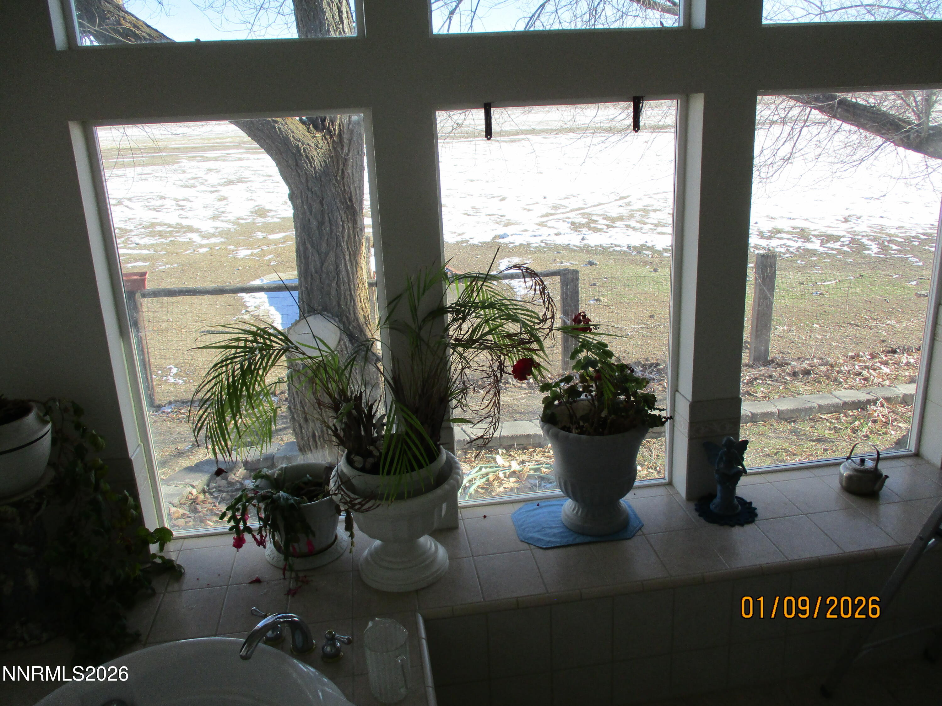 13405 Chimney Dam Road Paradise Valley, NV 89426 - Photo 41 of 90 a view of a living room with a floor to ceiling window and floor to ceiling window