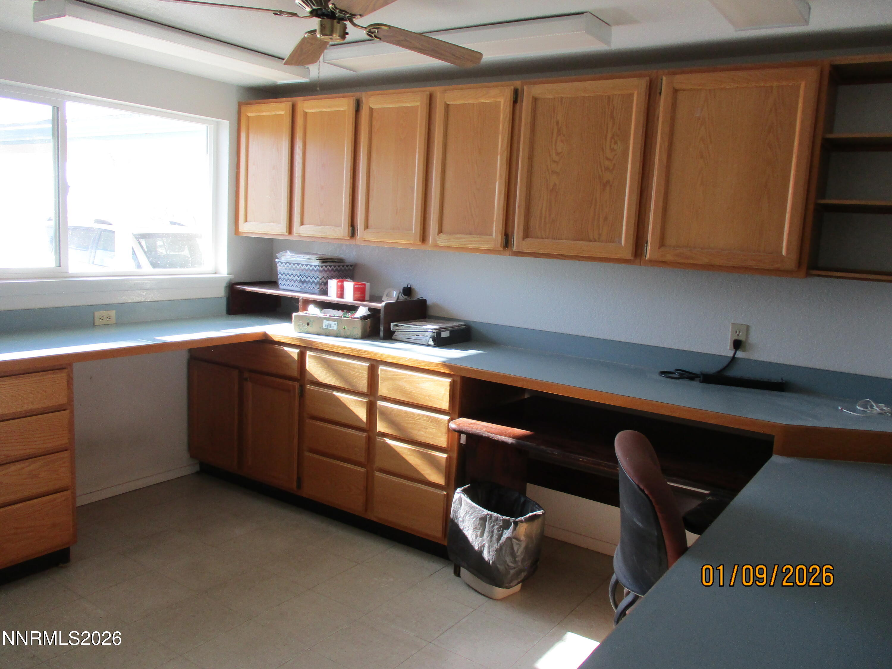 13405 Chimney Dam Road Paradise Valley, NV 89426 - Photo 53 of 90 a kitchen with a sink cabinets and window