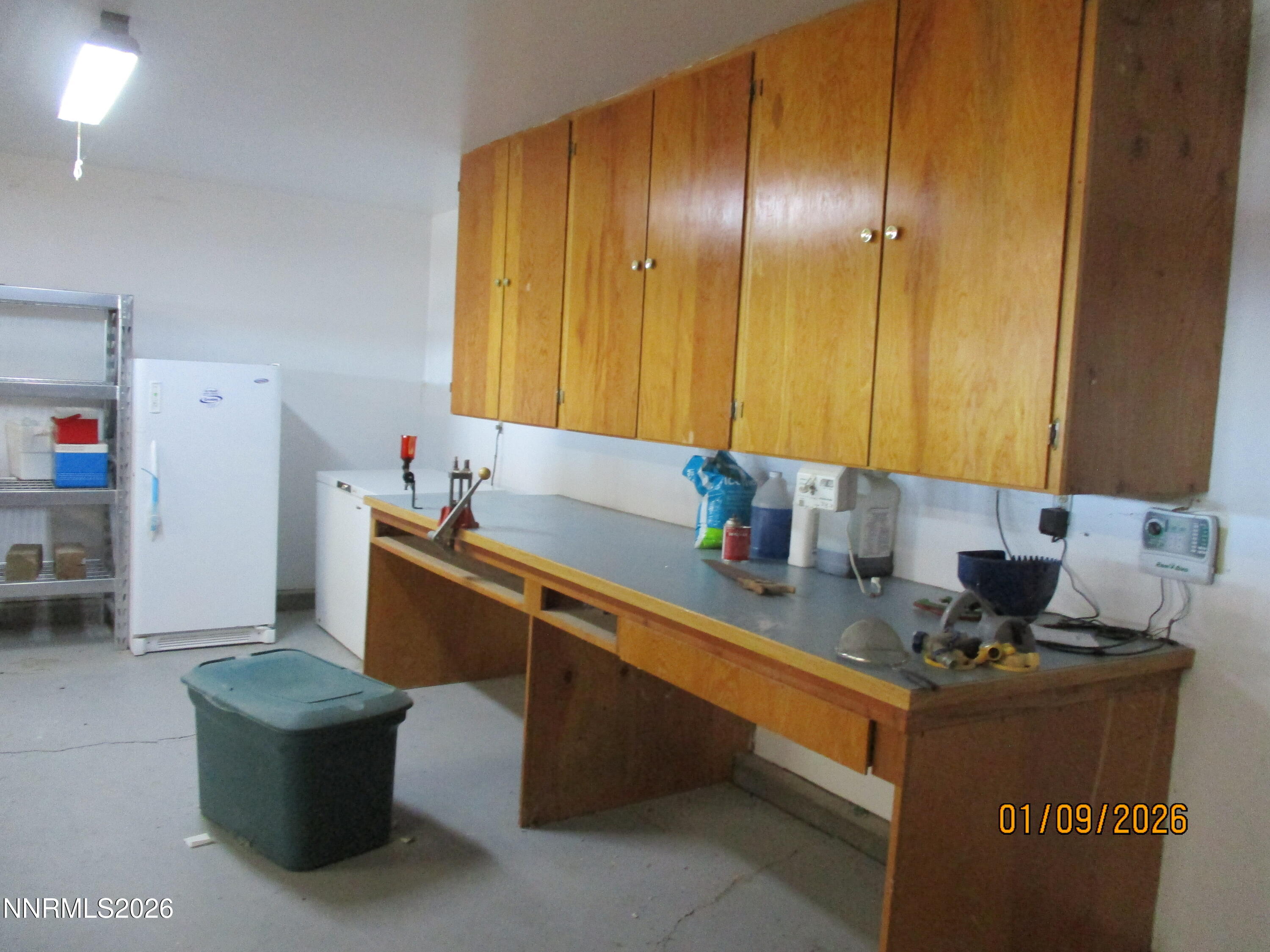 13405 Chimney Dam Road Paradise Valley, NV 89426 - Photo 57 of 90 a kitchen with a sink cabinets and a window