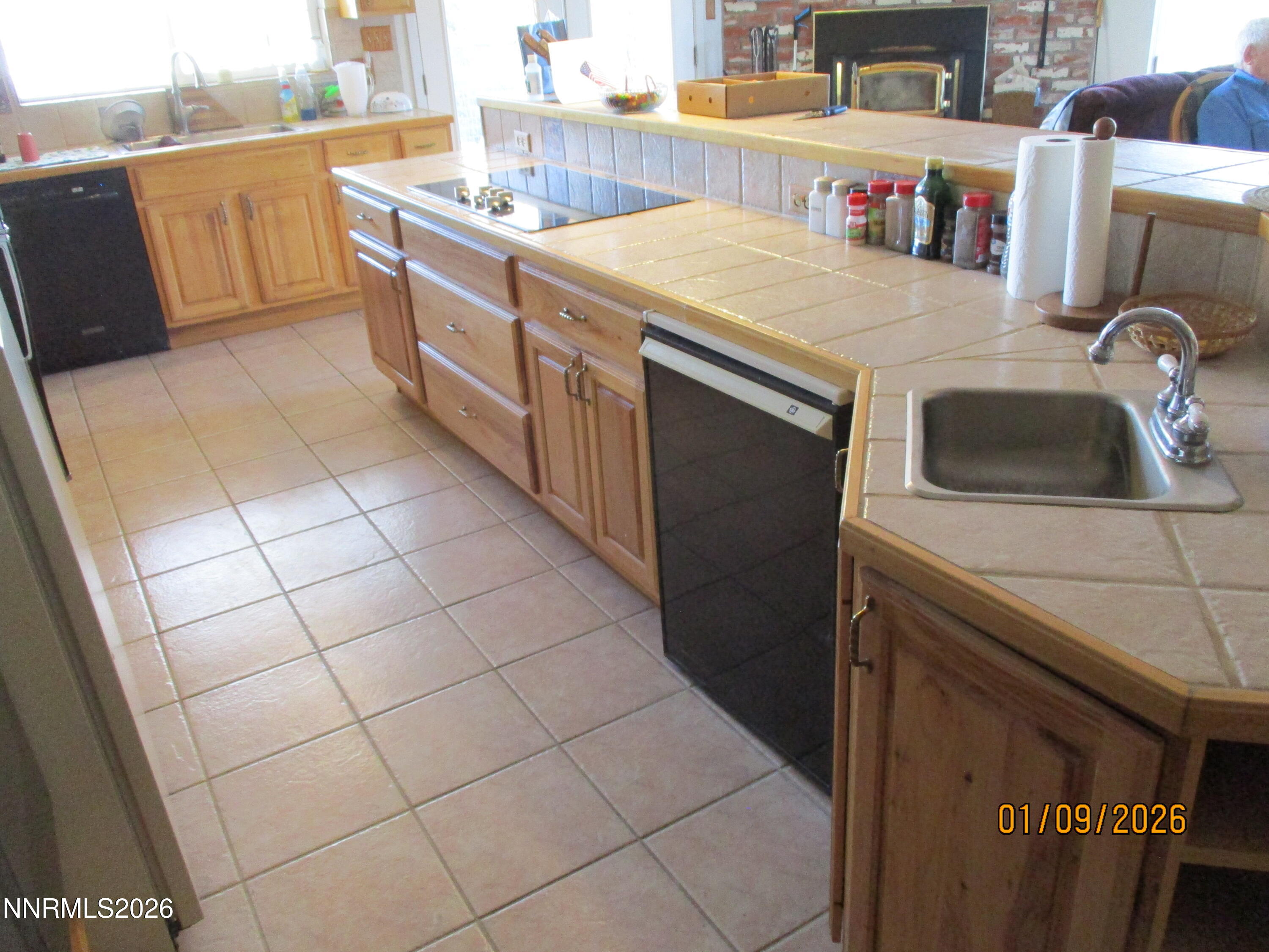 13405 Chimney Dam Road Paradise Valley, NV 89426 - Photo 63 of 90 a kitchen with a sink and cabinets