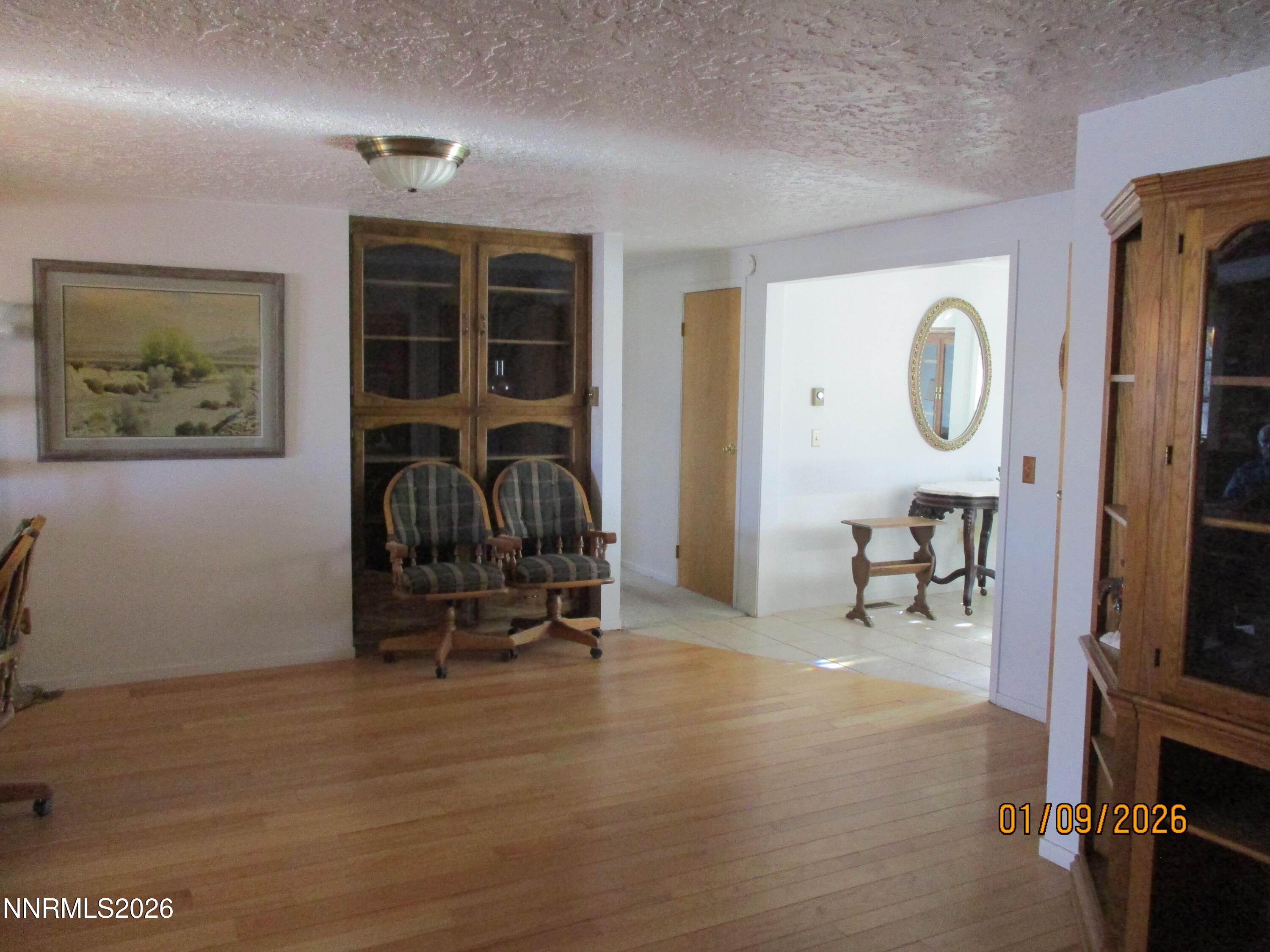 13405 Chimney Dam Road Paradise Valley, NV 89426 - Photo 67 of 90 a view of a livingroom with furniture and a window