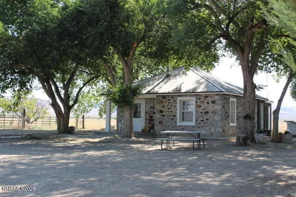 a view of a parking space in front of a building