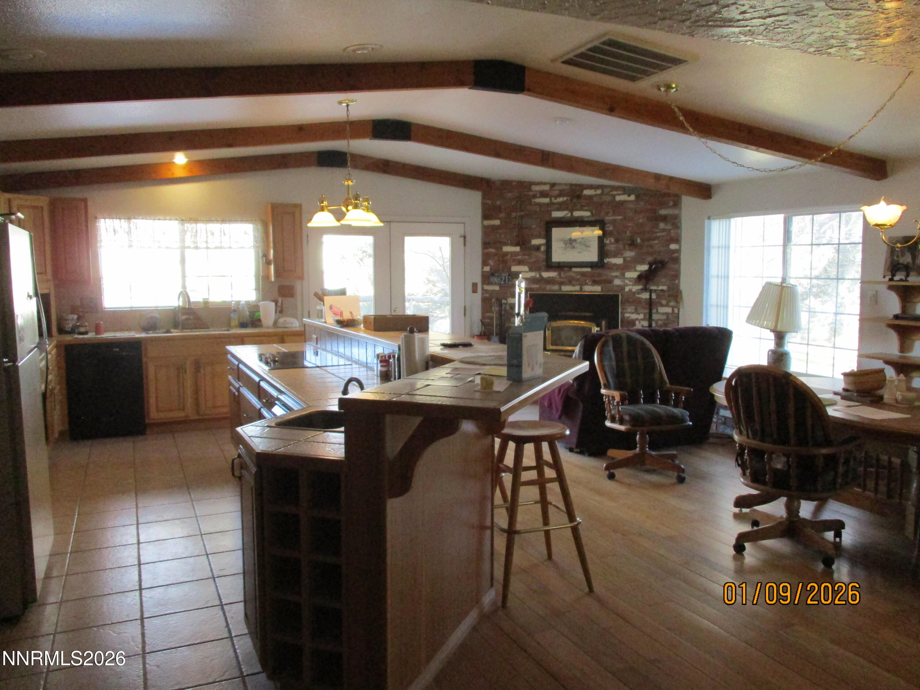 13405 Chimney Dam Road Paradise Valley, NV 89426 - Photo 74 of 90 a view of a dining room with furniture window and outside view