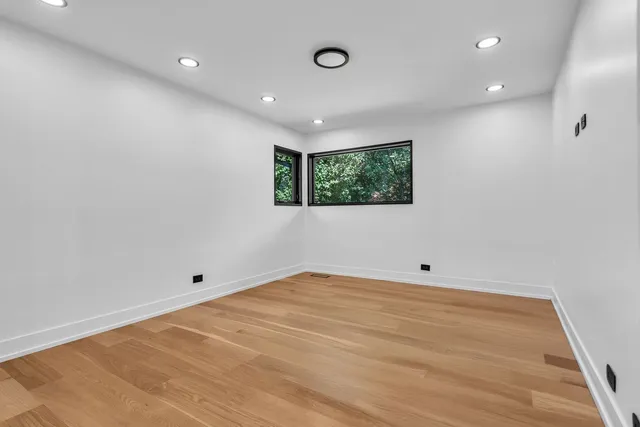 an empty room with windows