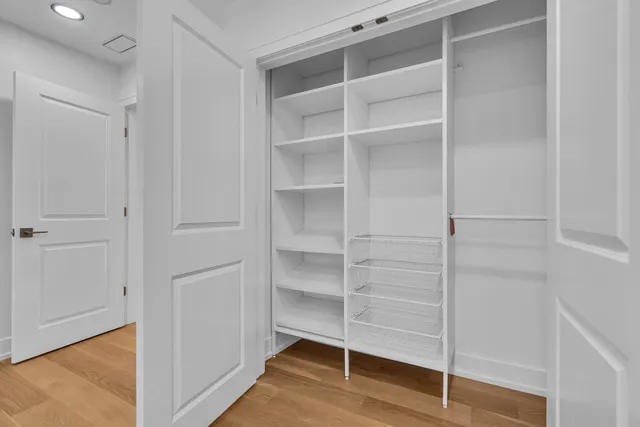 a view of an empty walk in closet