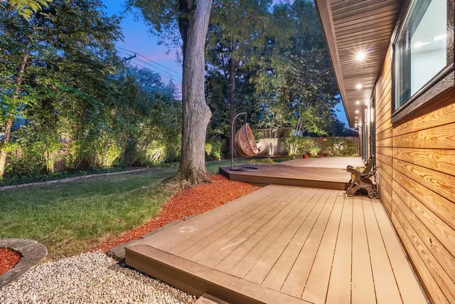 a view of backyard with seating space