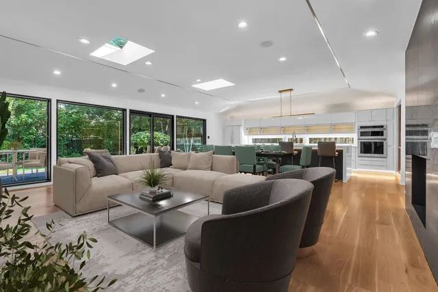 a living room with furniture and a table