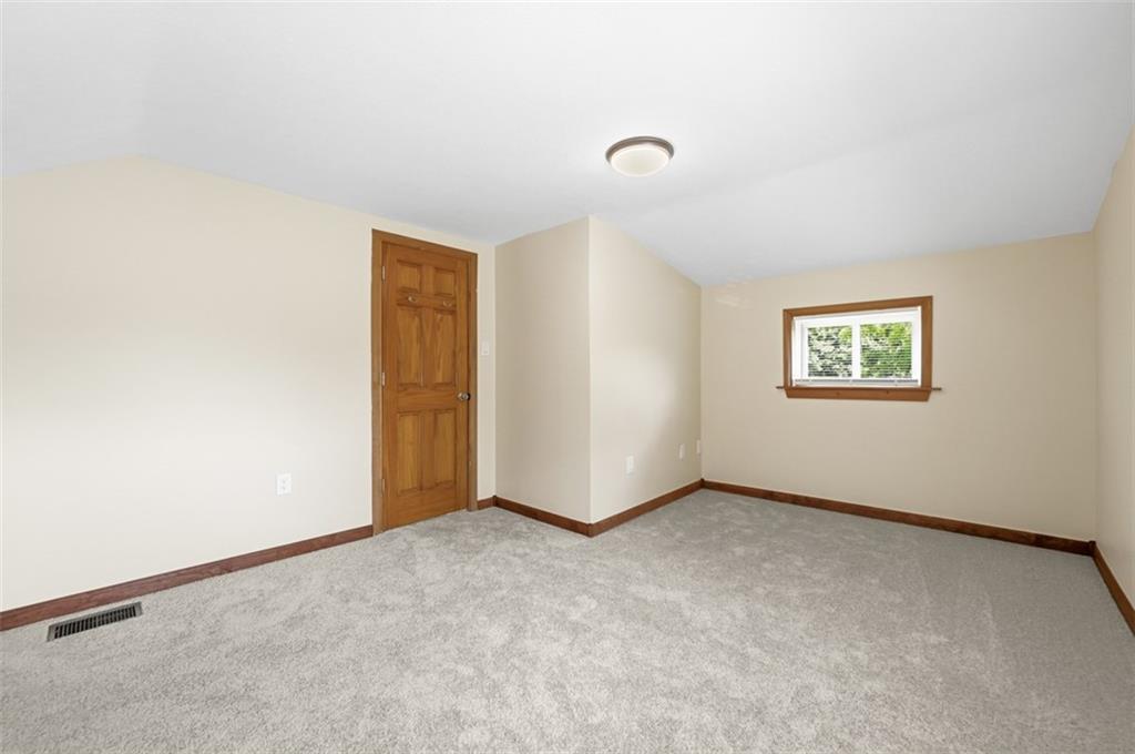123 Cemetery Road Slippery Rock, PA 16057 - Photo 24 of 33 This generously sized bedroom has ample space for furnishings.