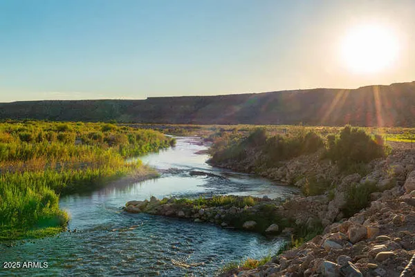 a view of lake with mountain