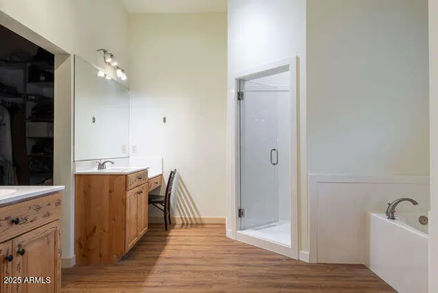 a view of kitchen with wooden floor