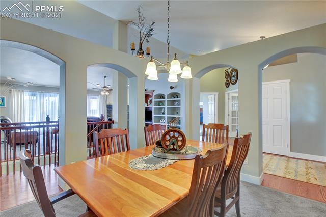 9947 Rockingham Drive Peyton, CO 80831 - Photo 6 of 43 Formal dining off of the entry