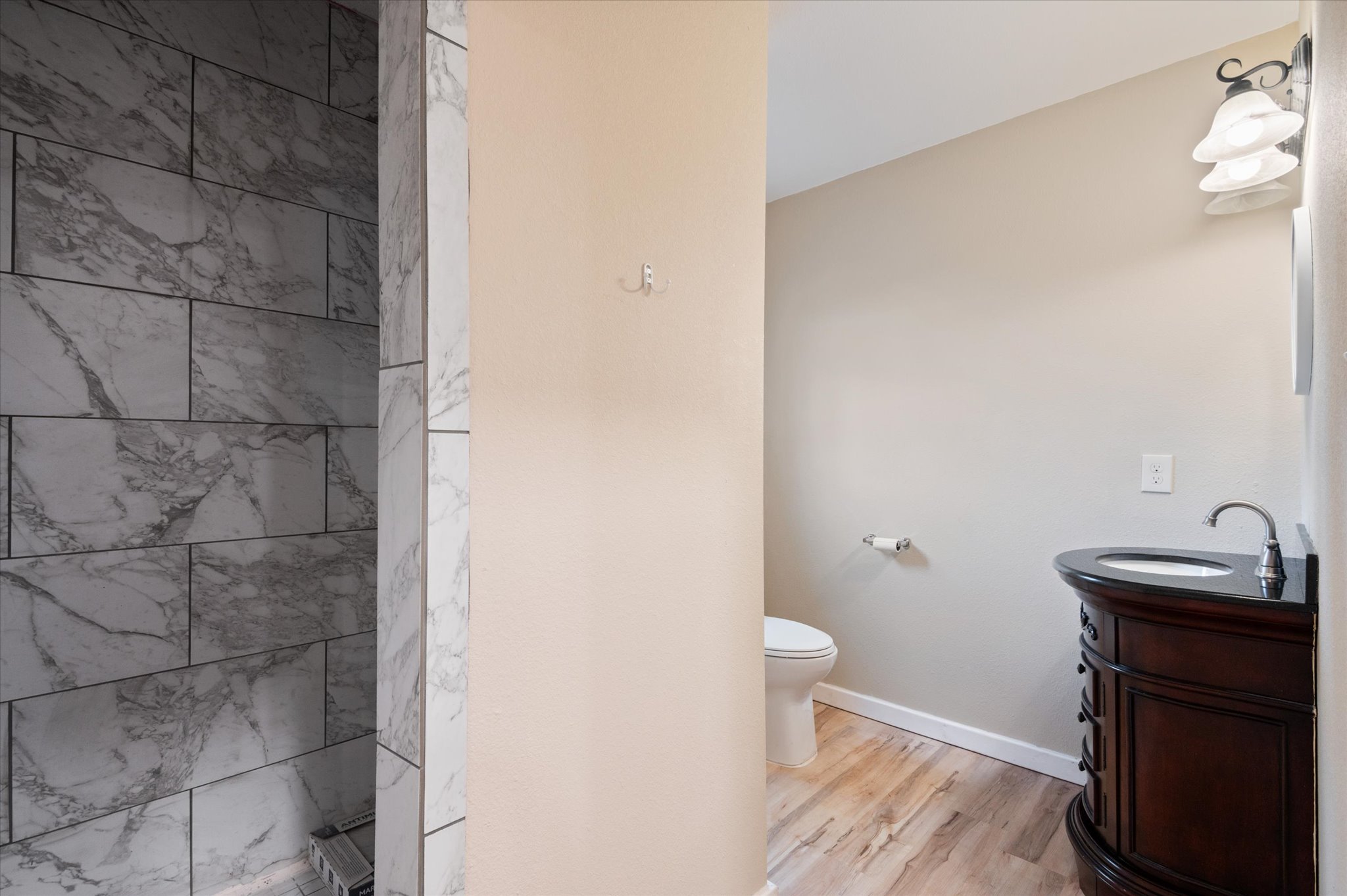 215 Go Away Road Blanco, TX 78606 - Photo 19 of 30 Primary In-Suite Bathroom w/ walk-in shower. dded in 2023