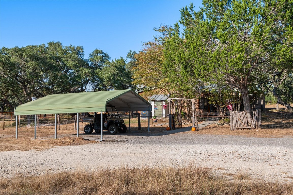 215 Go Away Road Blanco, TX 78606 - Photo 24 of 29 a view of a outdoor space with porch and furniture