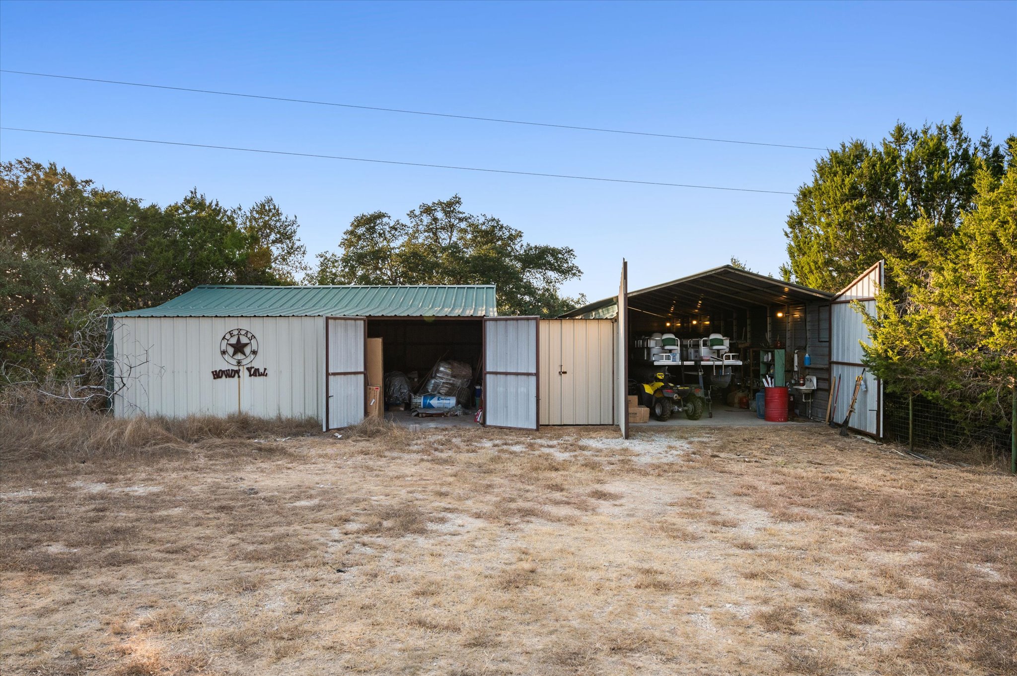 215 Go Away Road Blanco, TX 78606 - Photo 26 of 30 Large 1,520 sq ft barn perfect for storage, projects, or livestock — plus two additional storage sheds.