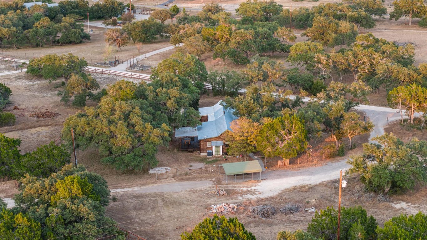 215 Go Away Road Blanco, TX 78606 - Photo 29 of 29 an aerial view of a house with a yard basket ball court and outdoor seating