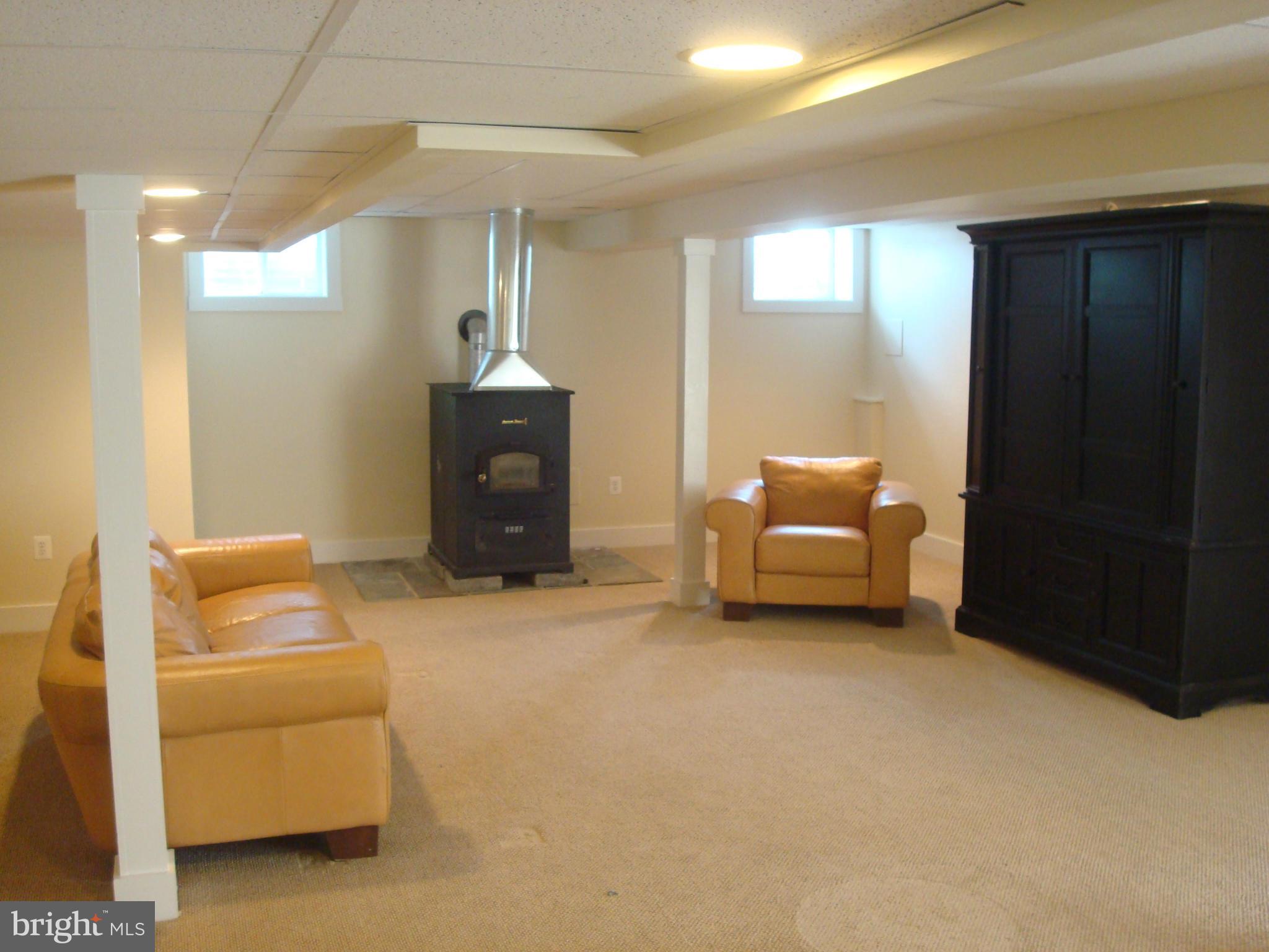 12761 Hiney Road Keymar, MD 21757 - Photo 22 of 30 a living room with furniture and a dining table with wooden floor