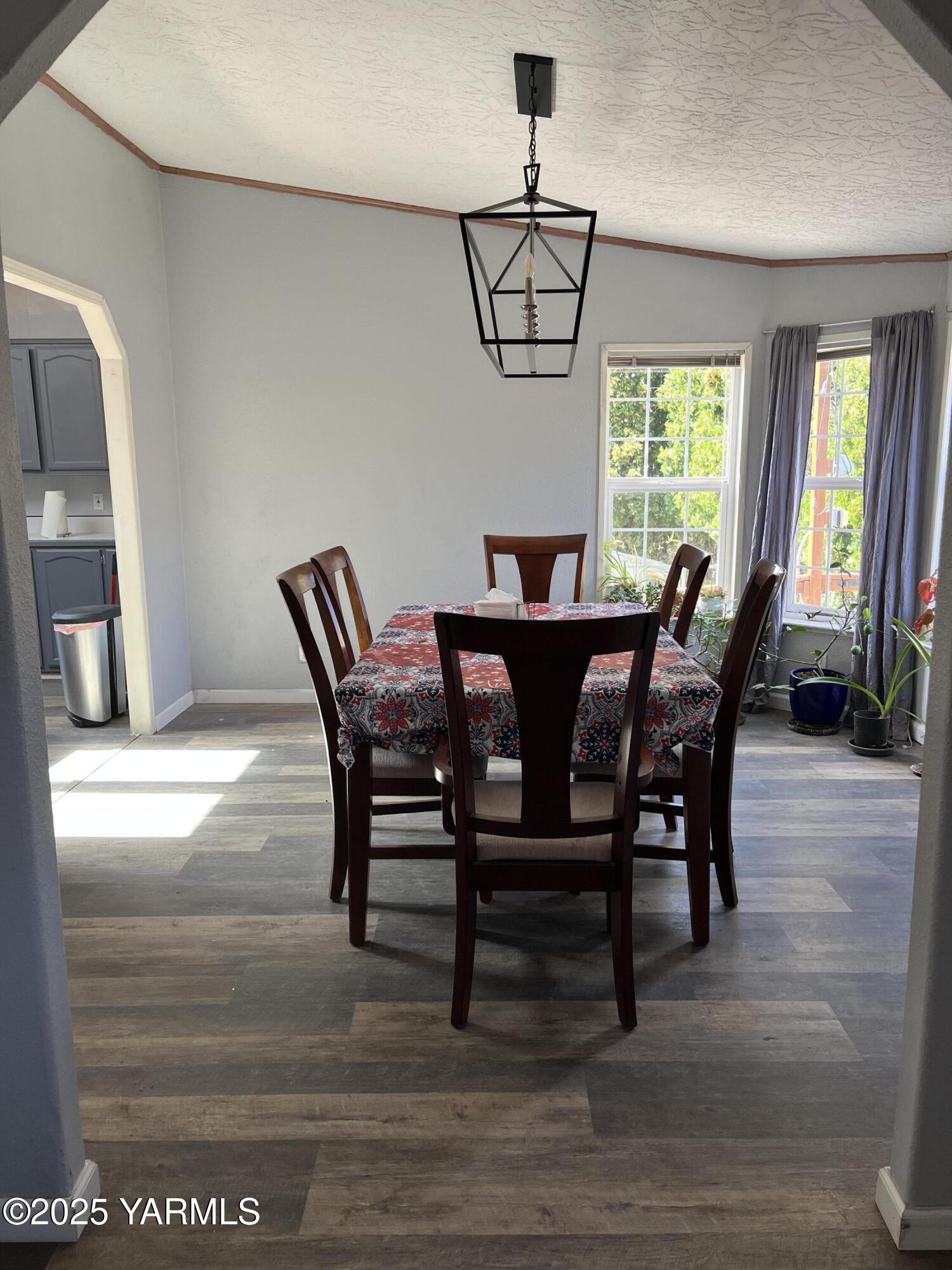 14190 North Wenas Road Selah, WA 98942 - Photo 21 of 62 a view of a dining room with furniture window and wooden floor
